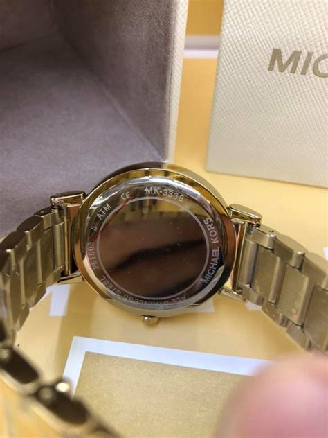 check michael kors watch serial number|real mk watch.